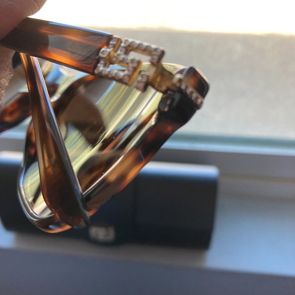 Tortoise shell Versace sunglasses and case